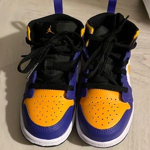 Worn once boy toddler Jordan 1 (color of shoe:yellow, purple, black & white)